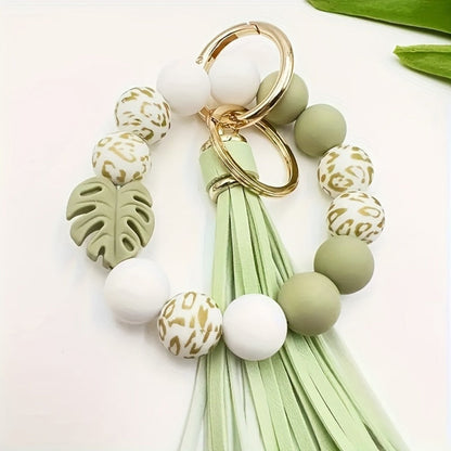 Keychain - Silicone Beaded with Leaf Charm & Tassel | Trendy Floral & Solid Color - product detail view 3