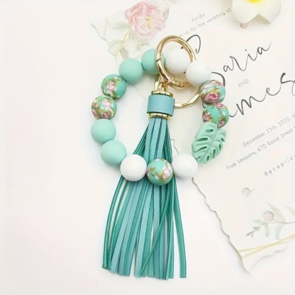 Keychain - Silicone Beaded with Leaf Charm & Tassel | Trendy Floral & Solid Color - product detail view 7