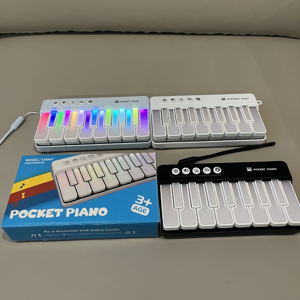 Mini Piano Keyboard, Pink ZJKDQFEN-1, Portable, Pocket-Sized for Basic Music Play detail image
