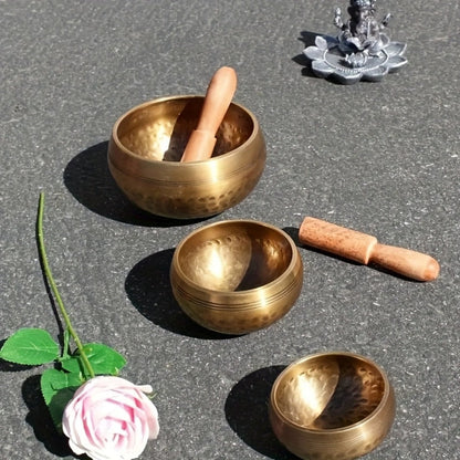 Nepalese Singing Bowl Set with Copper Bowls and Mahogany Strikers detail image - detail view 13