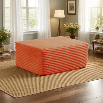 Ottoman shown in the Orange option